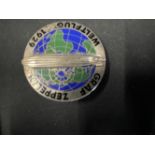 Aviation: 1929 white metal and enamel pin back badge with image of a Zeppelin over the World, with