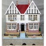 Toys/Pastimes: 'The Sycamores' is a Mock Tudor style dolls house of three storeys with nine rooms in