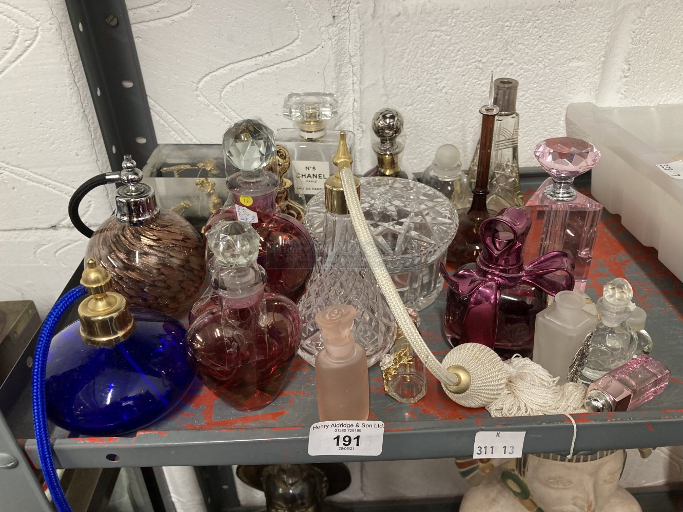 20th cent. Perfume bottles to include Cranberry style, plus a yellow metal model of a golfer. (