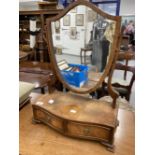 20th cent. Mahogany shield shaped dressing table mirror with two drawers to base, together with a