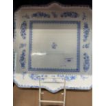 19th cent. Ceramics: Minton blue and white floral square hors d'ouvre, gilt border. 16ins. x 16ins.