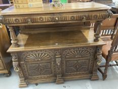 Early 20th cent. Tudor Revival oak buffet, two small drawers to top shelf with two cupboards