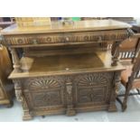 Early 20th cent. Tudor Revival oak buffet, two small drawers to top shelf with two cupboards