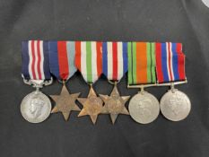 Militaria: WWII British Medal group with a reproduction Military Medal, 39-45 Star, Italy Star,