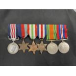 Militaria: WWII British Medal group with a reproduction Military Medal, 39-45 Star, Italy Star,