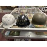 Militaria: Swiss Army M71 steel helmet, together with a post war German Army steel helmet, and a