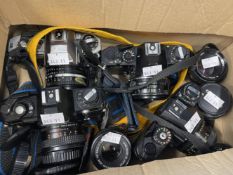 Cameras: Collection of four analogue SLR cameras plus four extra lenses, including Nikon FG with 1: