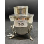 Halmarked Silver: Tea caddy, urn shaped, with cover, three shell shaped supports. 1998/99,