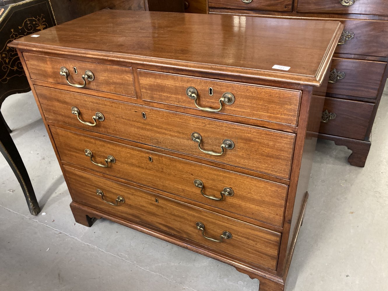 George III mahogany chest of two over three drawers of good proportions on bracket supports.