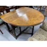 20th cent. Oak gate leg table. 40ins. x 58ins. x 30ins.