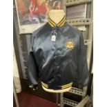 Law Enforcement: Blue nylon FBI baseball jacket, made by Dunbrooke, with embroidered FBI crest to