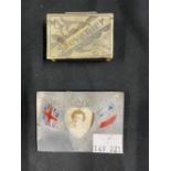 Militaria: WWI trench art white metal matchbox holder, together with an aluminium photograph fram,e,