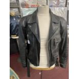 Transport: 20th cent. Harley Davidson heavy black leather motorcycle jacket, with heavily embossed