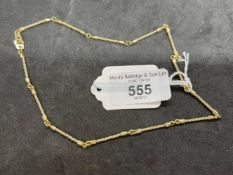 Jewellery: Yellow metal twisted bar link chain stamped 585, tests as 14ct gold. Length 15¾ins. Width