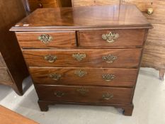 George III mahogany chest of two over three drawers of good colour on raised bracket supports.