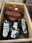 Cameras: Collection of five mid 20th cent. Compact 35mm cameras including Olympus Trip 35, leather