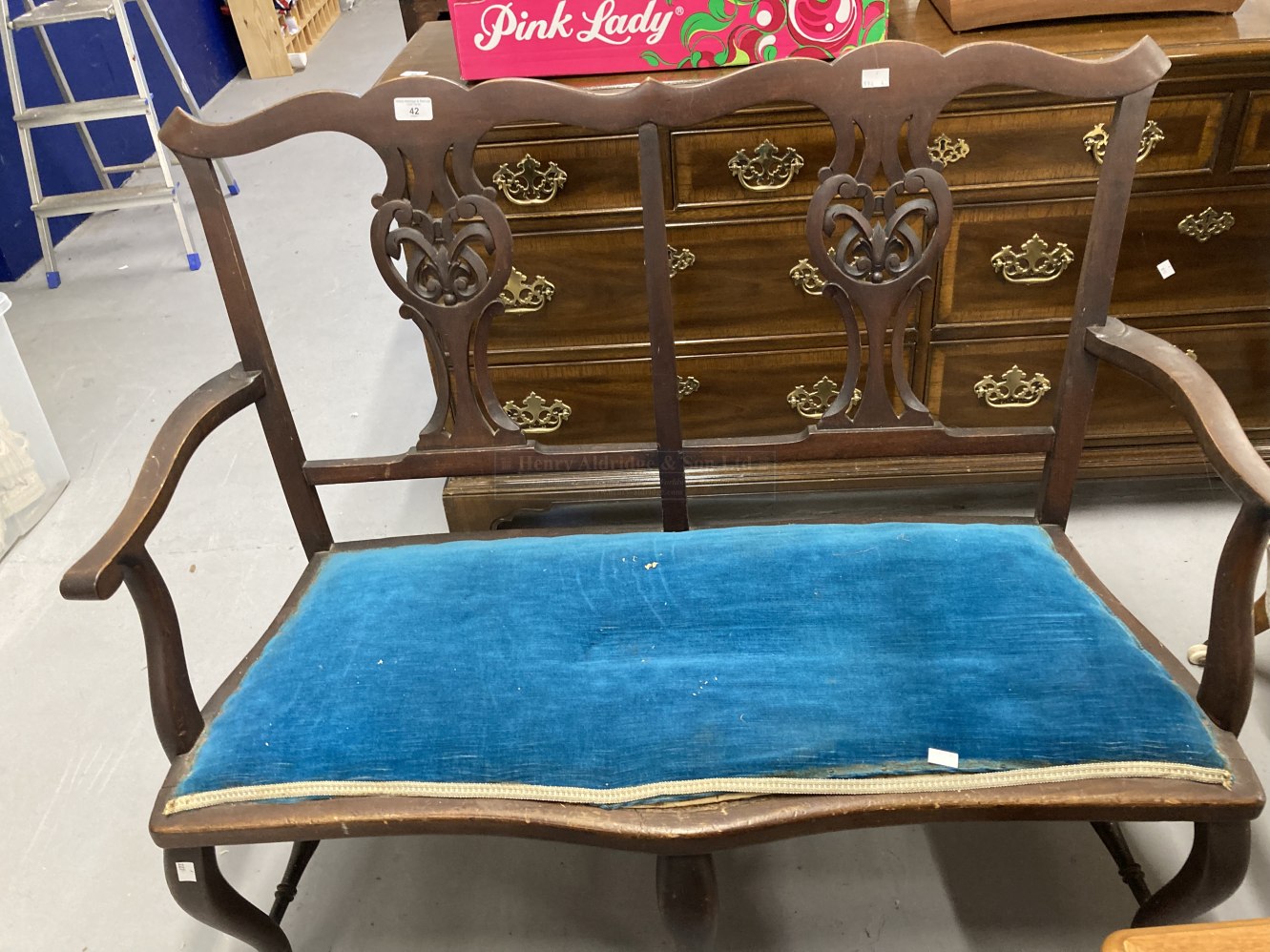 20th Cent. Chippendale style 2 seater hall seat with blue upholstered drop in seat.