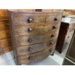19th cent. Mahogany bow front chest of two short drawers and four graduated long drawers on swept