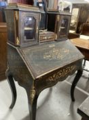 19th cent. French ebonised Bonheur du Jour, stylised inlaid decoration with brass mounts. 32ins. x