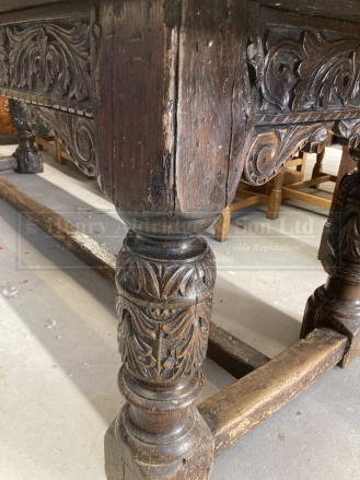 17th cent. Style, oak refectory table, the cleated plank top with foliate carved frieze, on leaf - Image 5 of 7