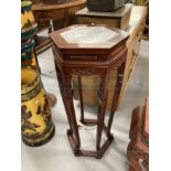 20th cent. Chinese hardwood stand with inset marble top. Height 33ins. x Width 13ins.