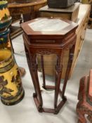 20th cent. Chinese hardwood stand with inset marble top. Height 33ins. x Width 13ins.