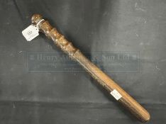 Lignum vitae truncheon impressed with No. 60395.