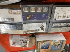 Stamps & First Day Covers: Two albums containing approx. 80 mint stamp presentation packs with