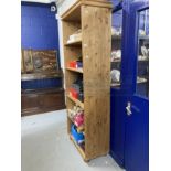 20th cent. Large pine bookcase, five shelves. 84ins. x 30ins. x 16ins.