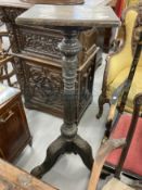 19th cent. Oak heavily carved torchère/lectern stand with later top on three splayed supports.