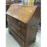 18th/19th cent. Mahogany campaign bureau on bracket supports, four drawers and brass furniture.