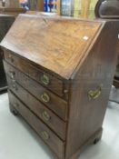 18th/19th cent. Mahogany campaign bureau on bracket supports, four drawers and brass furniture.