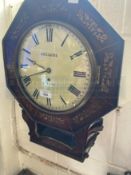 Clocks: Lecluse of London mahogany with brass inlay octagonal wall clock. 15ins.