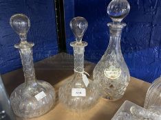 19th/20th cent. Glassware: Pair of wheel cut onion base decanters with elongated necks 10½ins