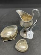 Hallmarked Silver: Helmet jug hallmarked Chester, oval trinket box hallmarked Chester, and a heart