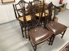 20th cent. Mahogany dining chairs, shield corn sheaf backs with Rexine drop in seats. (6)