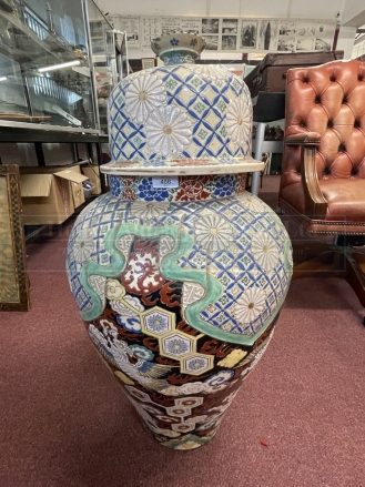 Late 19th cent. Japanese pottery ovoid vase and cover decorated with dragons and chrysanthemums. A/