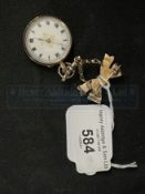 Hallmarked Gold: 9ct ladies brooch watch and bow suspension hanger. 24g. Inclusive.