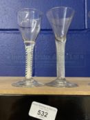 18th/19th cent. Wine glasses both with spiral decorated stems, one semi opaque. 6ins. (2)