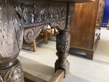 17th cent. Style, oak refectory table, the cleated plank top with foliate carved frieze, on leaf - Image 6 of 7