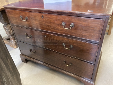 19th cent. Mahogany chest of drawers, three long cockbeaded drawers on square bracket feet. 44ins. x