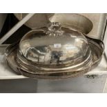 20th cent. Silver plated oval tray and electroplated meat cover with armorial. 41ins.