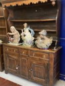 18th cent. Welsh oak/elm dresser with ornate fruit wood frieze to shelves. Base with two long