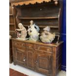 18th cent. Welsh oak/elm dresser with ornate fruit wood frieze to shelves. Base with two long