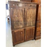 Early 19th cent. Mahogany linen press of modest proportions, two drawers and four cupboards,