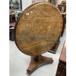 20th cent. Oak round drop top breakfast table on a triangular base. Dia. 37ins. Height 30ins.