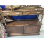 Early 20th cent. Oak buffet with carved floral decoration and brass furniture. 54ins. x 51ins. x