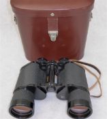 Three pairs of binoculars marked: Carl Zeiss Jena Jenoptem 10x50W (cased), Carl Zeiss 8x30 (A/F