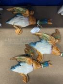 20th cent. Ceramics: Beswick Trio set of flying duck wall plaques. Model No. 596-2, 3, and 4. Issued
