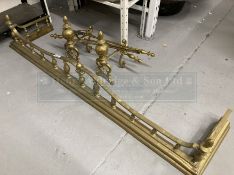 19th cent. Oversized brass fender, fire dogs and tools. 62ins.